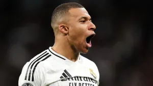 Kylian Mbappe nets late winner as Real Madrid beat nine-man Getafe to go top