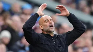 Pep Guardiola not worried that Manchester City have to chase down Arsenal