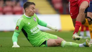 Rochdale stay at the summit despite goalless draw at Woking