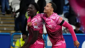 Stoppage-time double snatches Bolton dramatic victory at Huddersfield