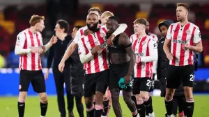 Brentford’s Igor Thiago (centre left) and Michael Kayode celebrate (John Walton/PA)