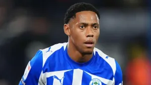 Ten-man Wigan return to winning ways against in-form Port Vale