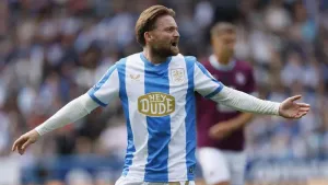 Wycombe make the most of Alfie May’s red card to see off Huddersfield