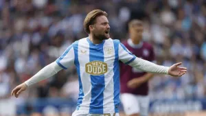 Huddersfield fight back three times to rescue draw at home to AFC Wimbledon
