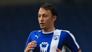 Kristian Dennis’ late strike earns Tranmere victory at Grimsby