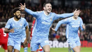 Liam Kitching and Ellis Simms score late to fire Coventry 10 points clear at top