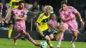Inter Miami forward Lionel Messi (10) kicks the ball away from Nashville SC midfielder Edvard Tagseth (20) during the second