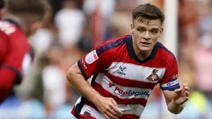 Owen Bailey’s stoppage-time winner sends Doncaster through to round two