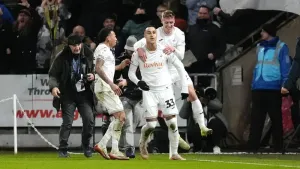 Swansea’s Adam Idah celebrates his winning goal against Wrexham (Nick Potts/PA)