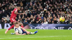 Liverpool’s Alexander Isak, left, scores during their 2-1 win at Tottenham (Adam Davy/PA)