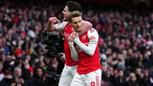 Declan Rice celebrates with Martin Odegaard following the Arsenal captain’s opener at the Emirates (Bradley Collyer/PA)