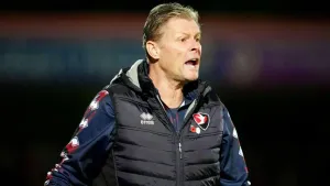 Cheltenham manager Steve Cotterill was happy to celebrate Buxton’s display in the FA Cup (David Davies/PA)