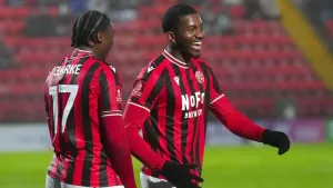 Daniel Kanu (right) was on target for Walsall (Owen Humphreys/PA)