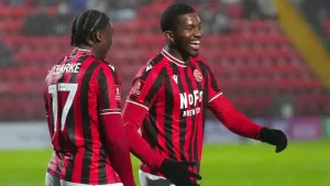 Daniel Kanu pounces to fire Walsall four points clear with victory at Oldham