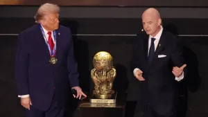 President Donald Trump (centre) was awarded the FIFA Peace Prize at the World Cup draw ceremony (Sam Corum/PA)