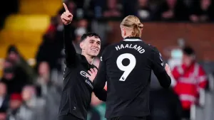 Erling Haaland reaches milestone as Man City hold on to win nine-goal thriller