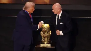 FIFA president Gianni Infantino, right, has been accused of breaching his organisation’s rules on political neutrality in re