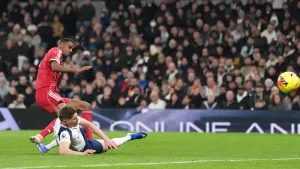 Micky van de Ven slides in on Alexander Isak (Adam Davy/PA)