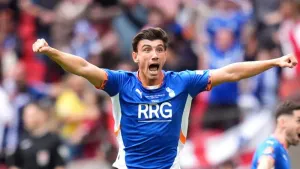 Late Kian Harratt goal for Oldham knocks Walsall off the top of the table