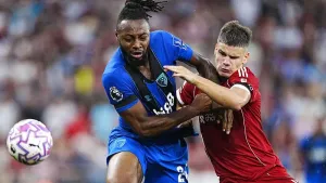 Antoine Semenyo, left, and Liverpool’s Milos Kerkez in action at Anfield earlier this season (Peter Byrne/PA)