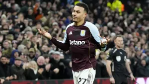 Morgan Rogers celebrates after scoring in Aston Villa’s 3-1 win over Manchester United that keeps them in Premier League tit