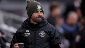 Paul Warne pleased to see MK Dons edge League Two promotion-rivals Swindon