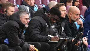 Kolo Toure (centre) and says Pep Guardiola is as passionate as ever (Mike Egerton/PA)