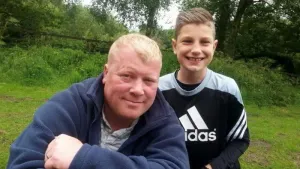 Manchester United defender Rhys Bennett and his father David, who took his own life in October (handout)