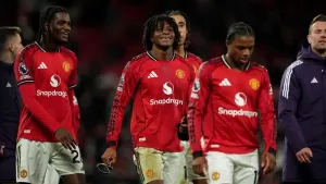 Patrick Dorgu celebrates Manchester United’s win over Newcastle (Martin Rickett/PA)
