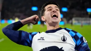 Falkirk’s Ben Parkinson celebrates after scoring the winner penalty (Andrew Milligan/PA).