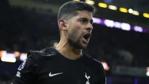 Tottenham’s Cristian Romero celebrates his late equaliser (PA)