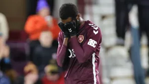 Beni Baningime was sent off in the 15th minute (Steve Welsh/PA)