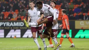 Hearts celebrate Landry Kabore’s early opener (Steve Welsh/PA)