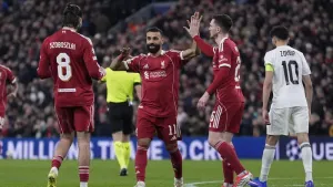 Liverpool’s Mohamed Salah celebrates scoring (Peter Byrne/PA)