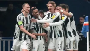 Joe Willock (centre left) celebrates after scoring Newcastle’s equaliser (Michael Euler/AP)