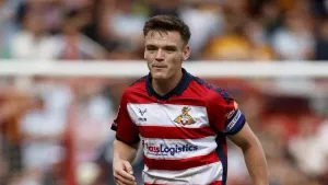 Owen Bailey snatches stoppage-time winner for Doncaster at Wimbledon