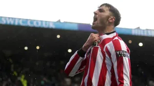 Tom Cannon celebrates scoring (Martin Rickett/PA)