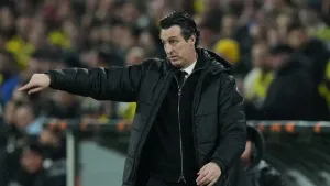 Unai Emery was happy his side prevailed in tough circumstances (Francisco Seco/AP)