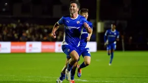 Will Grigg scored a last-gasp equaliser for Chesterfield at MK Dons (David Davies/PA)