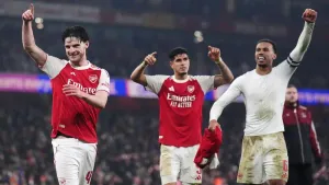 Arsenal’s Declan Rice (left), Piero Hincapie and Gabriel celebrate after beating Chelsea to reach the Carabao Cup final (Joh